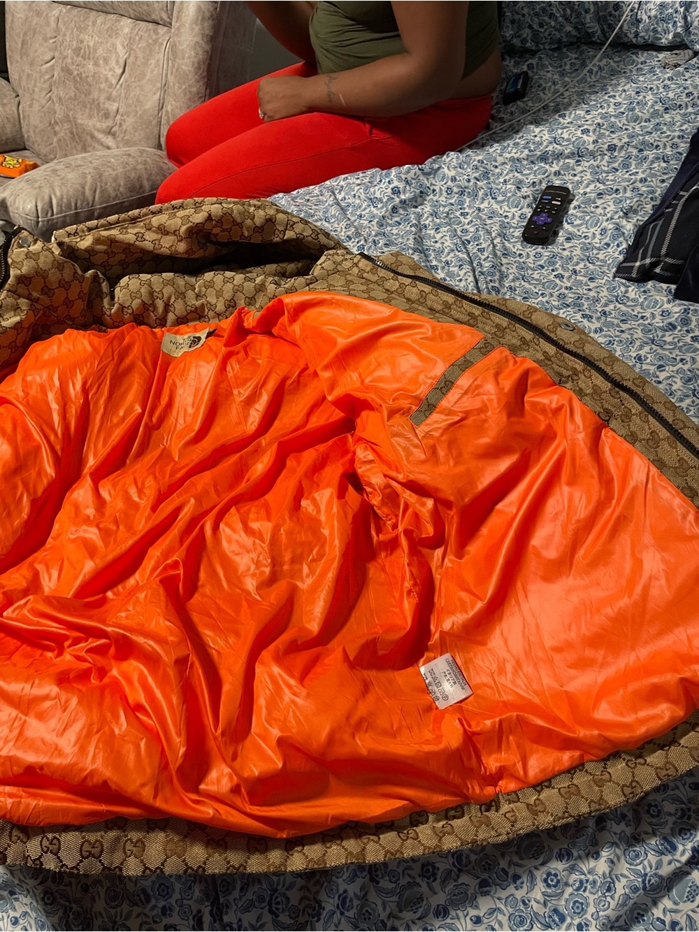 The North Face Kids Puffer Jacket - Brown Exterior with Bright Orange Lining